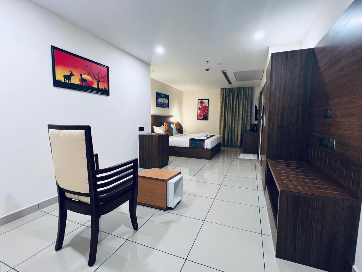 Hotel Seapark Kollam Buitenkant foto